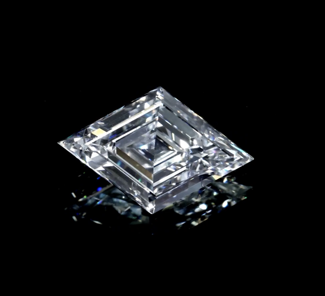 Kite-shaped step-cut diamond on black background